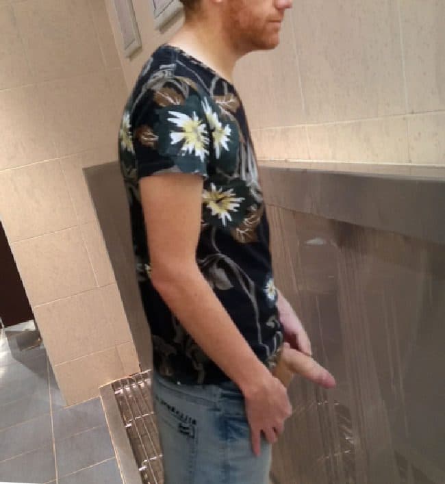 Guy Taking A Piss