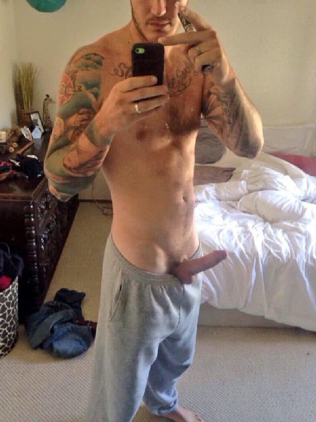 Tattooed Man Showing Cock